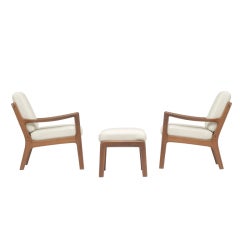 pair of armchairs with ottoman by Ole Wanscher