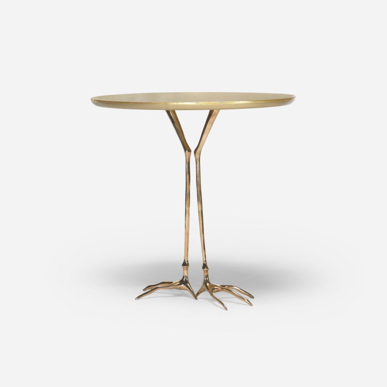 German-born artist Meret Oppenheim is among the most celebrated surrealists of the past century. A gold-hued surface perched atop spindly bird legs, the Traccia table walks the line between art and design.