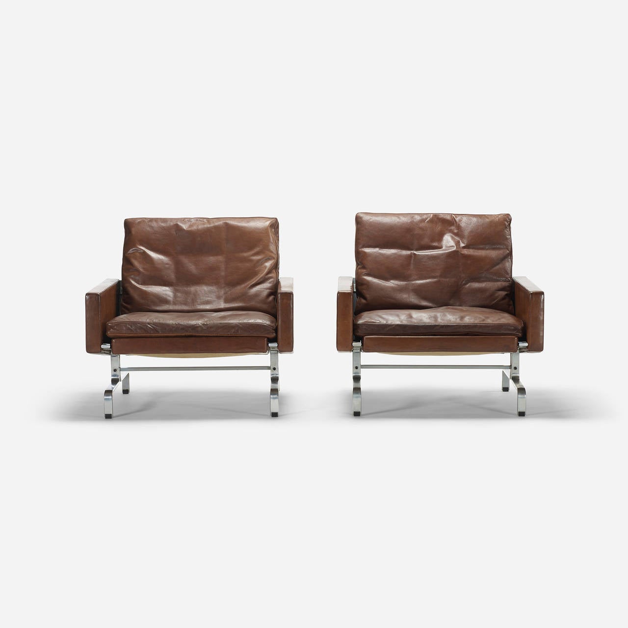 PK-31 lounge chairs, pair by Poul Kjaerholm for E. Kold Christensen.