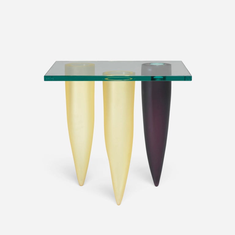 This work is number twenty-five from the edition of seventy-five. One leg on this table is hollow functioning as a built-in vase. Etched studio and manufacturer's mark to edge: [Daum Starck 25/75]. The range of objects to which Philippe Starck