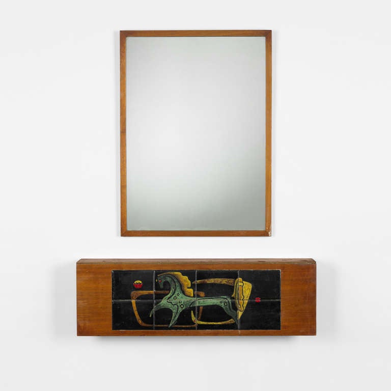 Mirror measures: 22 w x 30 h inches. Console features a flip-top front extending the surface to twenty-six inches. Signed with applied manufacturer's label to reverse of mirror: [Kagan-Dreyfuss Inc].