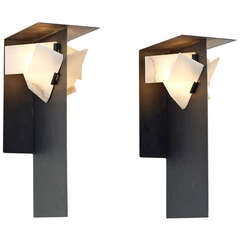 sconces, pair in the manner of Pierre Chareau