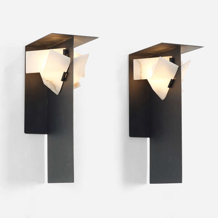 sconces, pair in the manner of Pierre Chareau