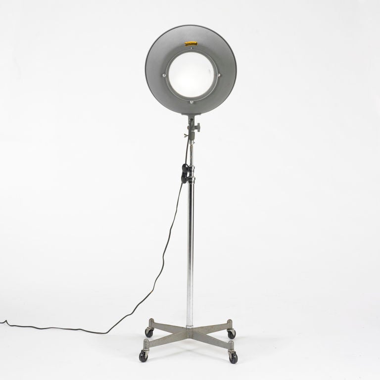 This adjustable lamp extends to 120 inches in height. Signed with decal manufacturer's label to fixture: [Kodak Pola-Light 115 Volts Model2 375 Watts Made in Rochester NY USA Eastman Kodak Company T.M. Reg. U.S. Pat. Off.].