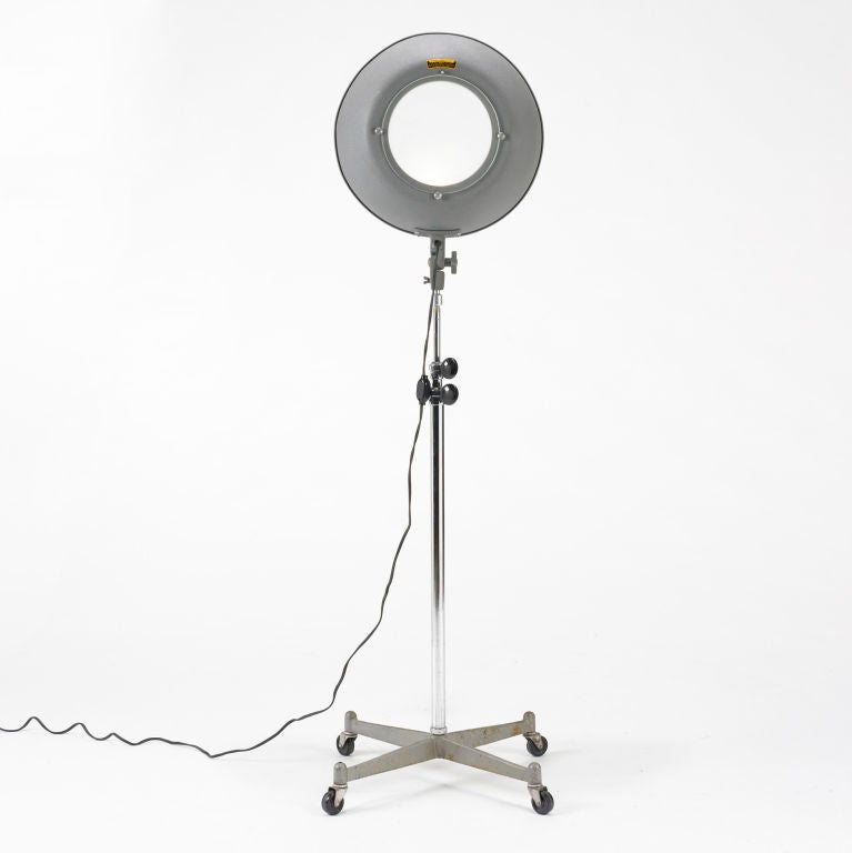 This adjustable lamp extends to 120 inches in height. Signed with decal manufacturer's label to fixture: [Kodak Pola-Light 115 Volts Model2 375 Watts Made in Rochester NY USA  Eastman Kodak Company T.M. Reg. U.S. Pat. Off.].