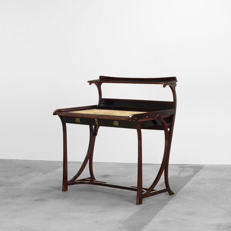 Desk features two drawers and a single shelf. Signed with paper manufacturer's label to underside: [Thonet Wien].