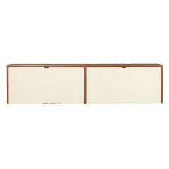 wall-mounted cabinet, model 121 by Florence Knoll