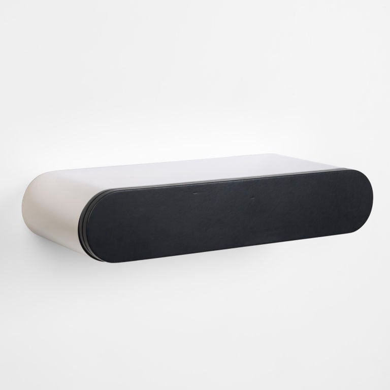 wall-mounted console by Paul Evans