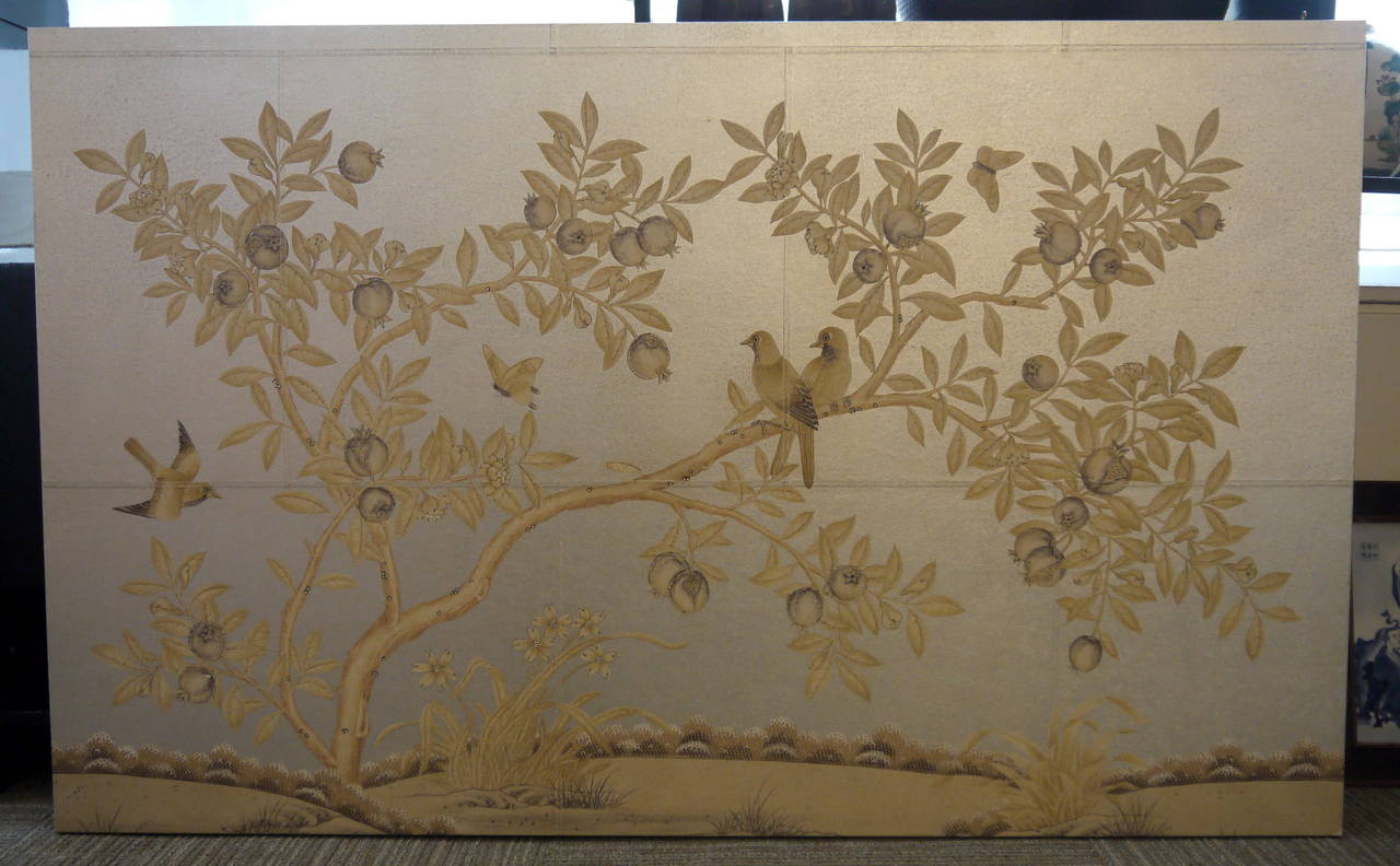 A section of the design Sepia Garden, which is hand painted in soft colors, on a pieced and antiqued silver background.

The design features a tree with flowers and pomegranates, and birds and butterflies.

This has been mounted on a panel, and