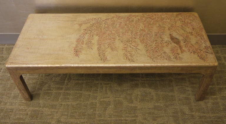 Incised silver leaf coffee table by Max Kuehne, signed, with design of a bird in a willow tree.

C. 1950