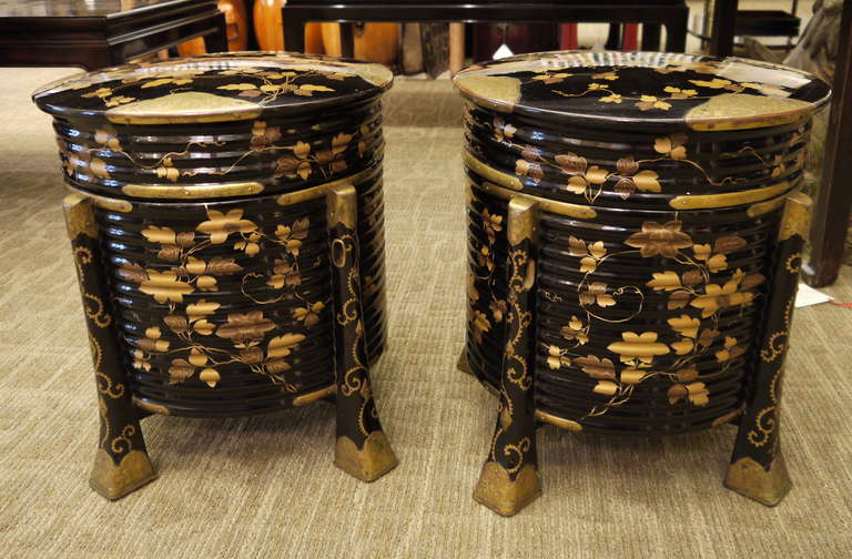 Large round Hokkai boxes with lids.  Each has four feet, with ornate hardware on lid and legs.

