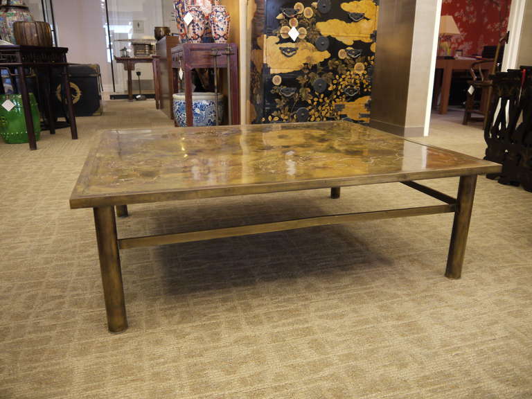 A very large and gorgeous coffee table by Philip and Kelvin Laverne, with Zodiac design etched in the top.

Signed.