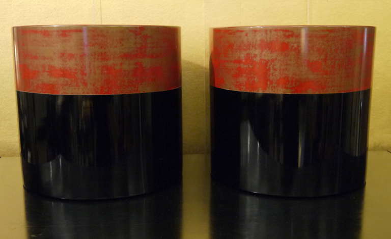 A pair of vintage, boldly designed hibachi with black lacquer bases, and wide red stripe with gold accents at top.

Copper liners.