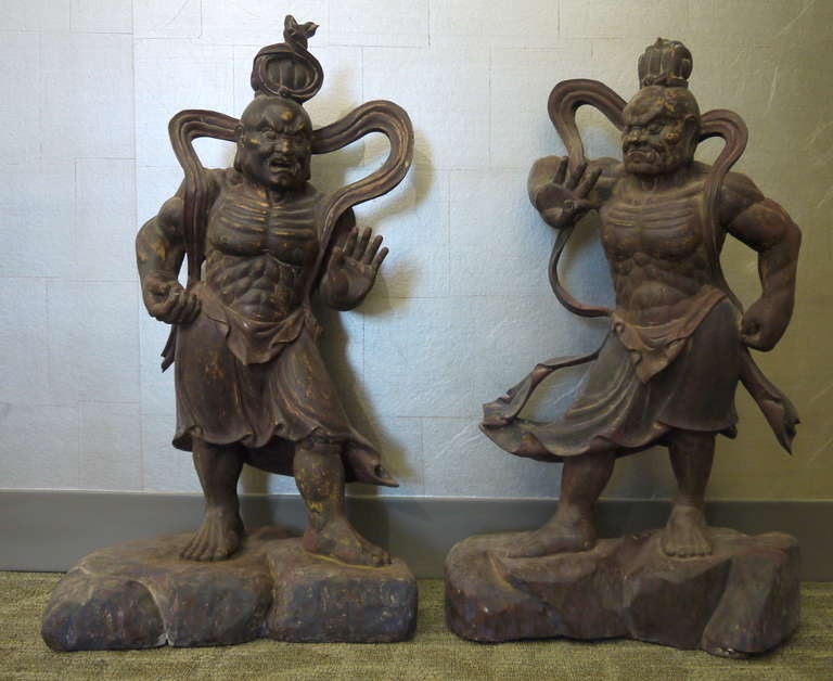 An impressive pair of wood carved and lacquered Nio figures. Such figures were guardians of the Buddha and would stand outside temples.

18th-19th century.