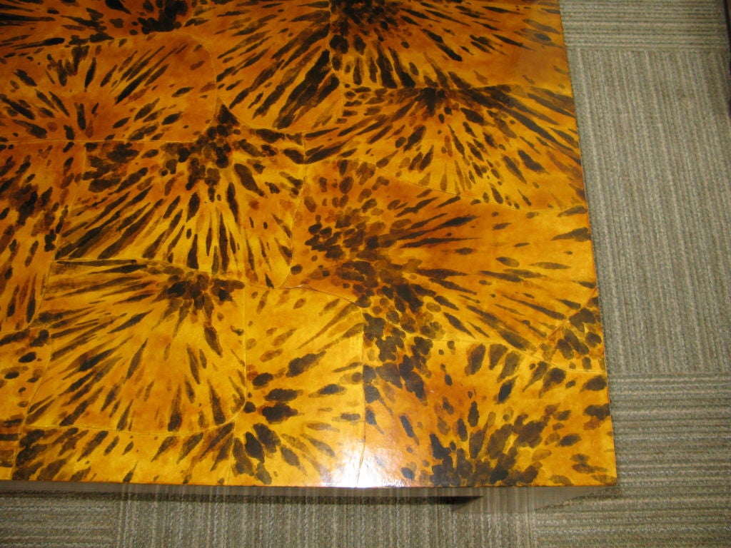 Handpainted faux tortoise shell random pattern, finished in cashew lacquer, on a Parson style coffee table.<br />
<br />
*May be made in other sizes and colors