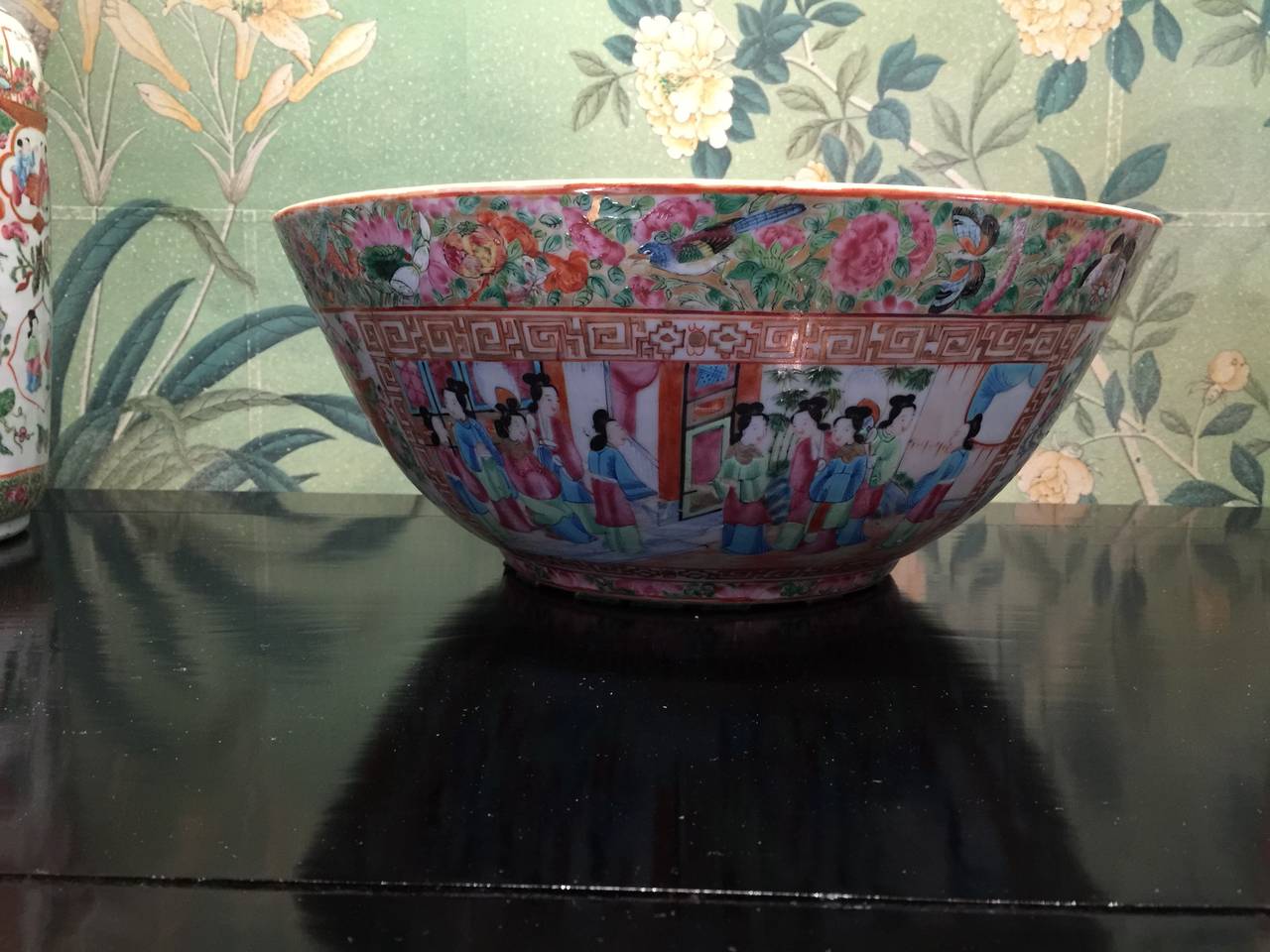 19th century, Chinese large rose medallion bowl with reserves of landscape and figure design and borders with flowers, birds and butterflies.

The reserves have borders with gilt, in Greek key pattern.