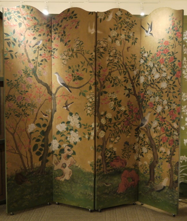 A fabulous pair of large four panels screen, with a vibrantly painted antique Chinese wallpaper on the fronts.

Screens have elegant curved tops, and the backs are painted with simple borders.

This wallpaper originally hung in the dining room