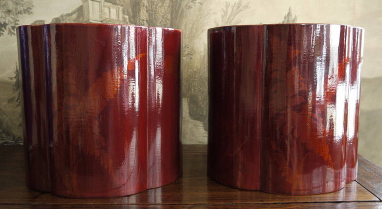 A beautiful lacquered pair of dark red hibachi, with faint gold design.

Delicate, fluted shape.

With copper liners.