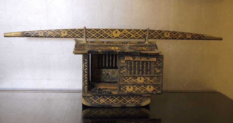 An amazing, intricately detailed miniature Japanese palanquin, 18th-19th century. Full scale palanquins were used to carry wealthy Japanese, particularly royalty. This piece has all of the details of a full scale version, including beautifully
