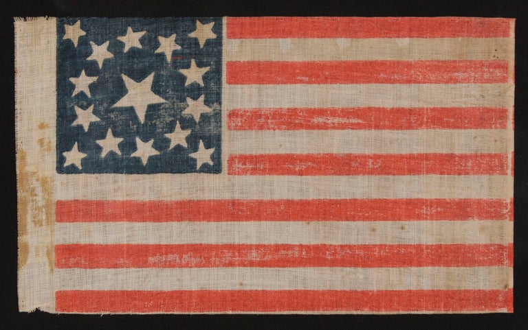 15 STARS, MADE EITHER TO CELEBRATE KENTUCKY STATEHOOD OR TO GLORIFY THE SOUTH, 1861-1865, CIVIL WAR PERIOD, EXTREMELY RARE:

15 star American parade flag with 13 stripes, printed on coarse, glazed cotton. The stars are arranged in a medallion