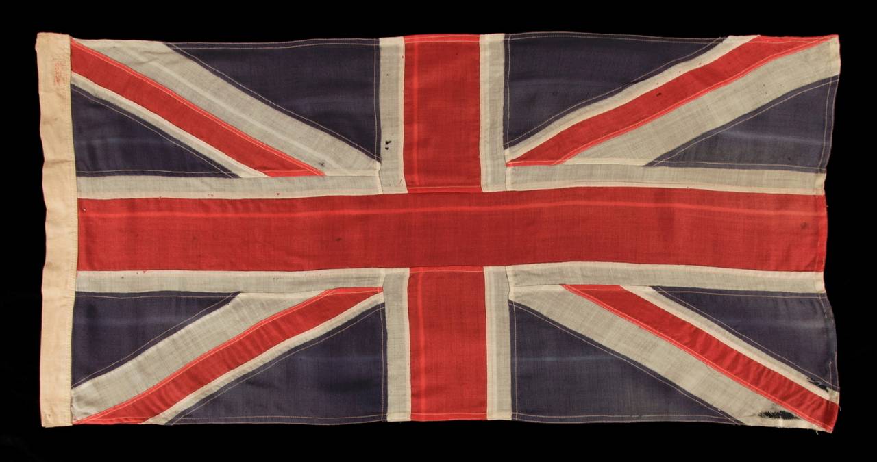 UNION JACK IN A NICE SMALL SCALE, MADE BY WELL KNOWN SCYCO IN TORONTO, ONTARIO, CANADA, 1910-20's:

British Union Jack made sometime between approximately 1910 and the 1920's, with wonderful, slightly faded colors and a maker's label from SCYCO, a