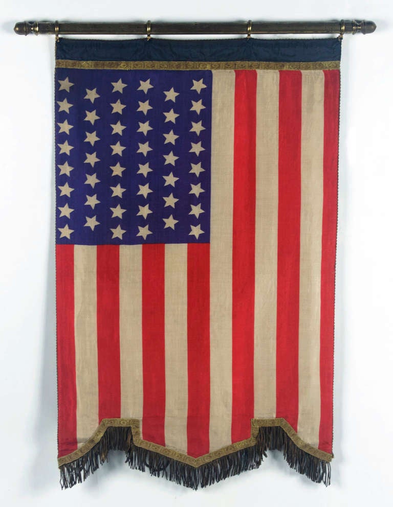 Silk banner with gilded and hand-painted lettering and bullion trim, made for the comet social and outing club in San Francisco, California, 1912:

 Silk banner of the type produced for fraternal organizations, fire departments, and veteran's