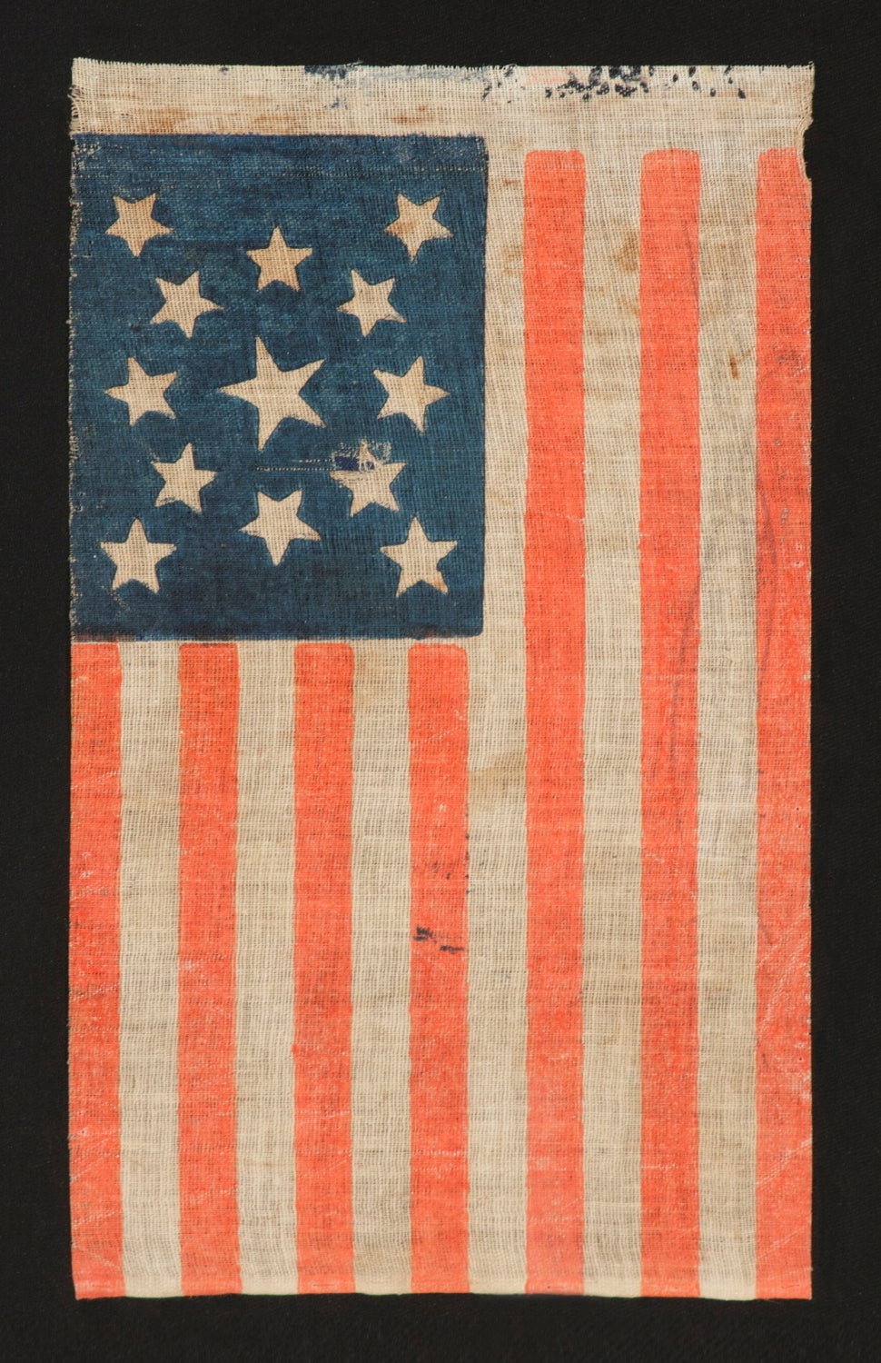 13 STARS IN A MEDALLION CONFIGURATION ON A LARGE SCALE PARADE FLAG MADE FOR THE 1876 CENTENNIAL:

13 star American national parade flag, printed on coarse, glazed cotton, made for the 1876 celebration of our nation’s 100-year anniversary of