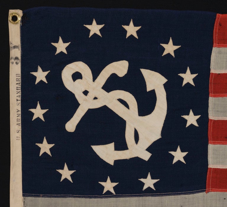 The medallion configuration, 13-star, 13-stripe flag with a canted center anchor was entered into official use in 1848, following an act of Congress, that made it the official signal for U.S. pleasure sailing vessels. The need for such a flag arose
