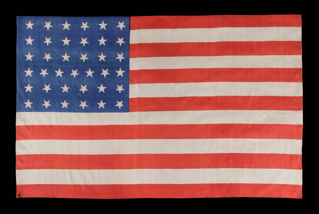 37 STARS ON A LARGE SCALE SILK PARADE FLAG WITH 