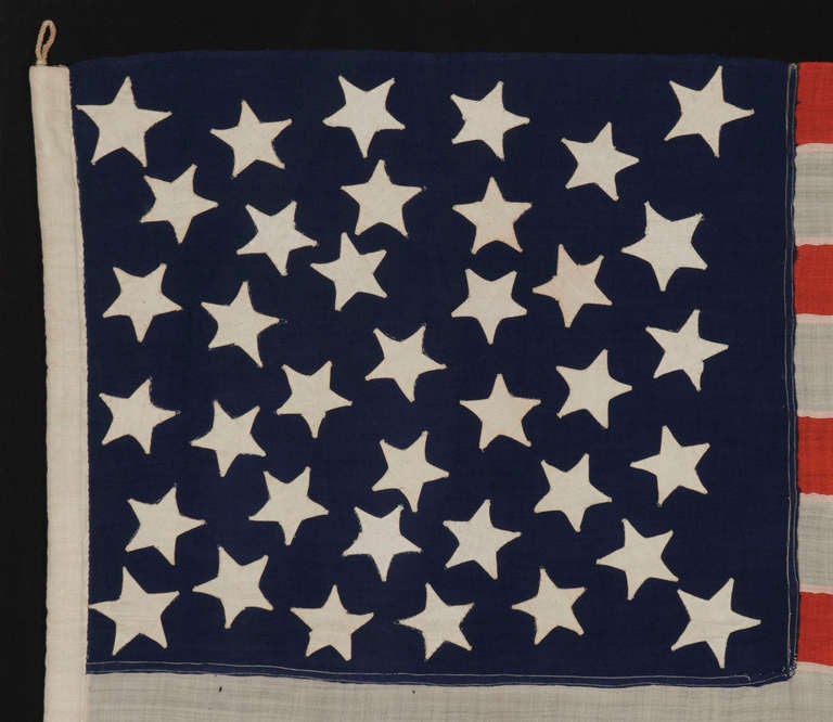 37 Stars In A Medallion Configuration On An Antique American Flag