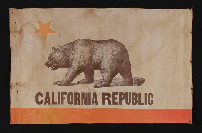 CALIFORNIA STATE FLAG, AN ESPECIALLY EARLY EXAMPLE WITH AN ATTRACTIVE BEAR AND AN UPSIDE-DOWN STAR, CA 1893-1920:

 19th century state flags fall between very scarce and extraordinarily rare in the antiques marketplace. One primary reason for this