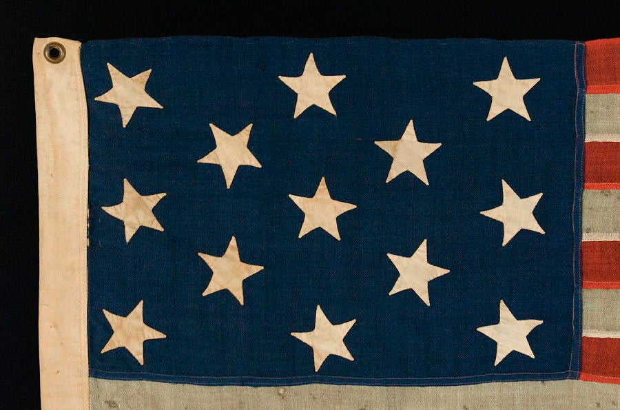 13 Hand-sewn Stars On A Flag With Elongated Proportions