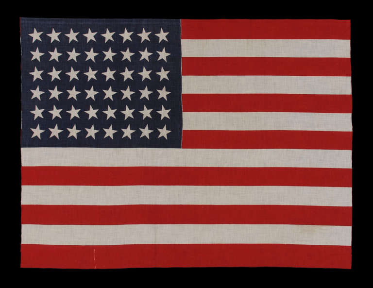 In 1912, President Taft passed an executive order that dictated, for the first time, an official design for the star field for American flags produced for the Department of the Government. This consisted of 6 rows of 8 stars, perfectly lined up,