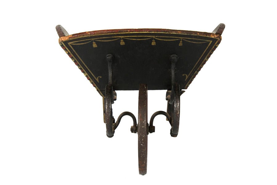 A TREMENDOUS CHILD'S WHEELBARROW FROM MAINE, CA 1840-1870:

Ex scudder smith. Great iron work and excellent paint-decorated surface.