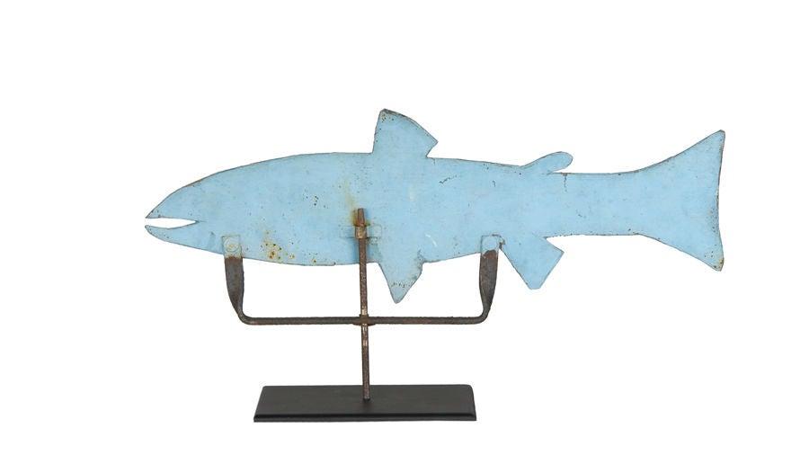 FISH WEATHERVANE IN ROBIN'S EGG BLUE PAINT, CA 1920:<br />
<br />
Fish weathervane, made ca 1920 of sheet metal, found with its original steel and ironwork roof mount bracket. With all of the fake sheet metal weathervanes floating around in the
