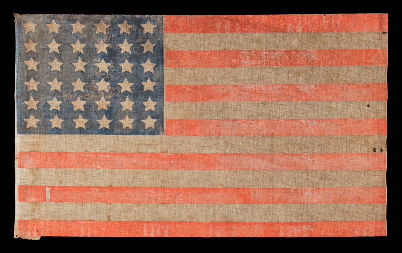 36 star antique American parade flag of the Civil War era, in an especially large scale and with bold color, 1864-1867, Nevada statehood:

36 star American national flag of the Civil War era, printed on coarse, glazed cotton. The 36th state,