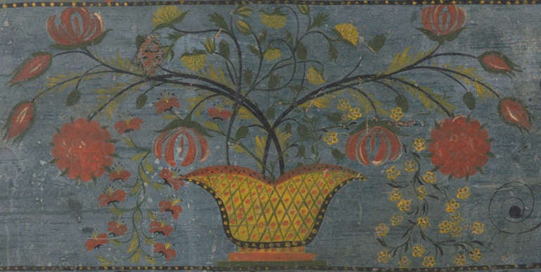 Painted Schoharie County, New York blanket chest, decorated with a beautifully embellished yellow urn of flowers on a blue ground. This is traditional fashion of the region, in which the most elaborately decorated New York chests were made, and one