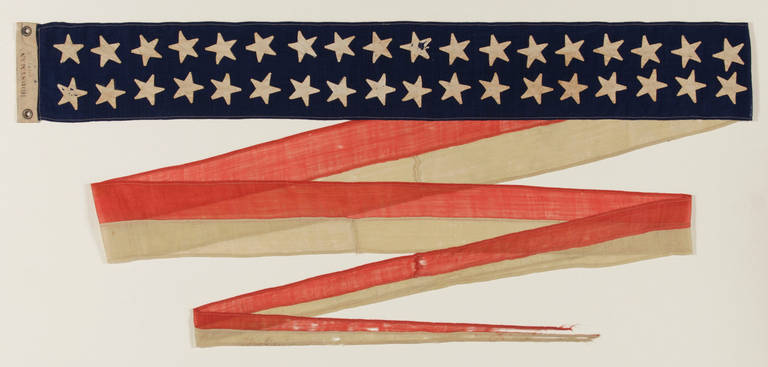Civil War Era U.S. Navy Commissioning Pennant, Extremely Rare with the Full Compliment of 36 Stars Reflecting the Number of States During its Period of Manufacture, Signed Horstmann, Philadelphia, 1864-1867:

Commissioning pennants are the