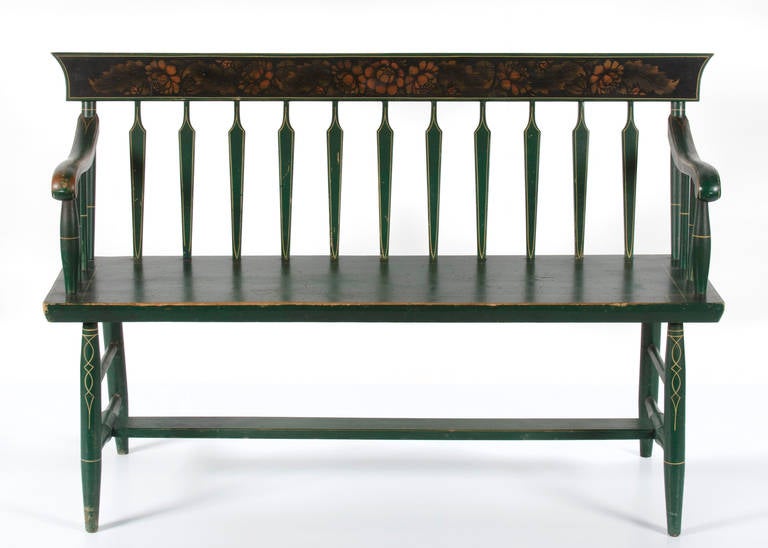 DIMINUTIVE SETTEE IN KELLY GREEN PAINT WITH GILT STENCILED DECORATION, ATTRIBUTED TO A SLEDMAKER IN PARIS HILL, MAINE, CA 1890:

Paint-decorated, arrow back settee in kelly green paint with a flared crest rail. The legs, arms and spindles have