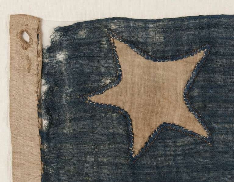 ONE OF THE EARLIEST FLAGS IN AMERICA:
 AN AUTHENTIC 15-STAR U.S. NAVY JACK, HANDED DOWN THROUGH THE FAMILY OF U.S. NAVY CAPTAIN THOMAS BROWN, 1792-1814:

Frame Size (H x L): 48.5