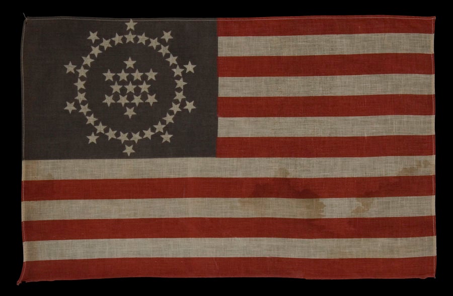 48 STARS, DESIGNED AND COMMISSIONED BY WAYNE WHIPPLE, 1909-1912, A RARE AND HIGHLY DESIRED EXAMPLE:<br />
<br />
Many people are not aware that for the first 135 years of the existence of the American National flag, there was no official way to