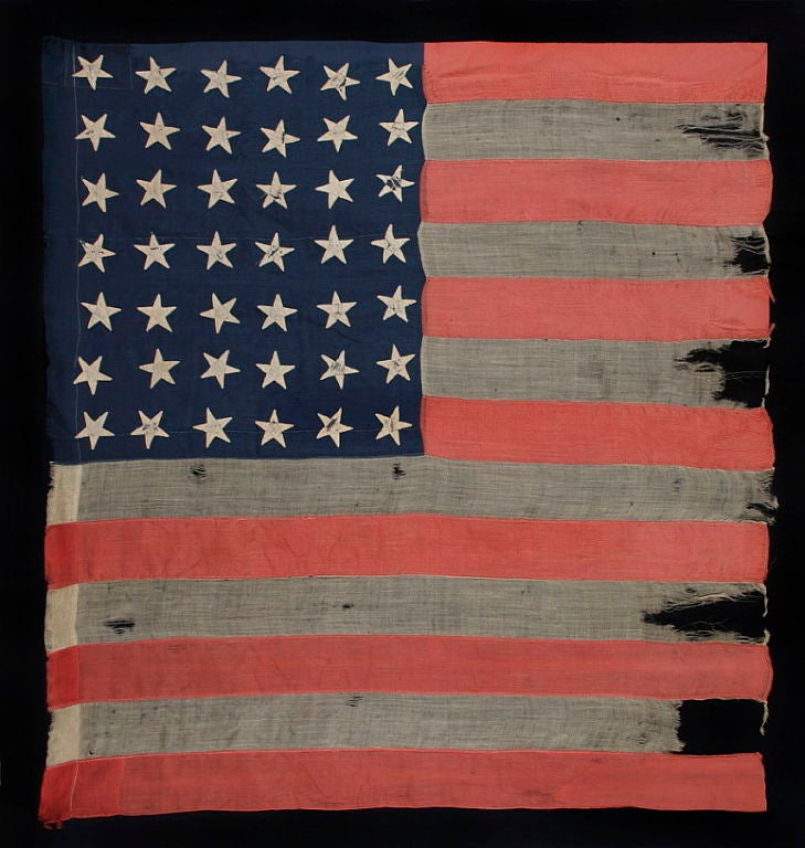 42 STARS, AN UNOFFICIAL STAR COUNT, 1889-1890, POSSIBLY A U.S. CAVALRY STANDARD, INTERESTING TALL AND NARROW FORMAT, WASHINGTON STATEHOOD:<br />
<br />
42 star American national flag, made in the 1889-90 period, probably for U.S. Army application