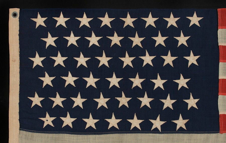45 Stars On A Small Scale Flag With Elongated Proportions
