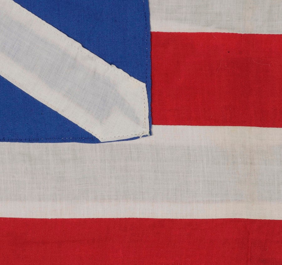 RARE HOMEMADE EXAMPLE OF THE “GRAND UNION”, THE FIRST NATIONAL FLAG OF AMERICA, LIKELY MADE IN 1926 FOR THE SESQUICENTENNIAL OF AMERICAN INDEPENDENCE:

The “Grand Union” is the most commonly used name today for the first national flag of the