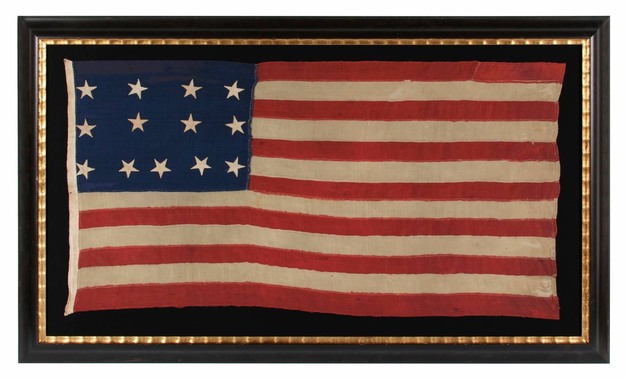 Exceptionally rare 13 star flag in a 4-4-5 lineal pattern, the only known example with this unusual star design, circa 1835-1865:

 We have made 13 star flags in America from 1777 to the present. The U.S. Navy used the 13 star count on small boats