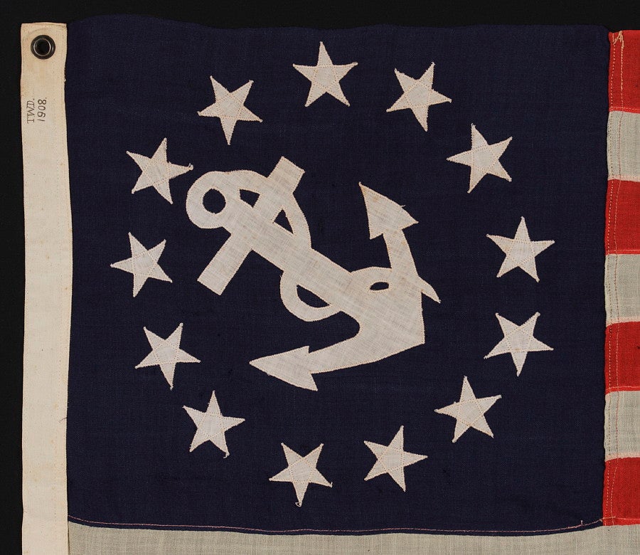 13 STAR PRIVATE YACHT ENSIGN, A NICE GRAPHIC EXAMPLE WITH AN ATTRACTIVE, CANTED ANCHOR, DATED 1908:

13 star private yacht ensign with an uncommonly fat and attractive anchor, signed 
