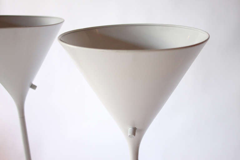 A Pair of White Floor Lamps designed for Nessen Studios by Von Der Lancken and Lundquist.