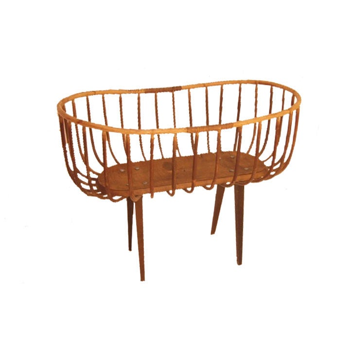 Wood baby bassinet originally from Antwerp. We estimate it is early 20th century.