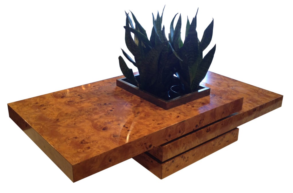 Beautiful Italian, Mid-Century burl wood coffee table with planter. Makes for a sleek and contemporary feel.