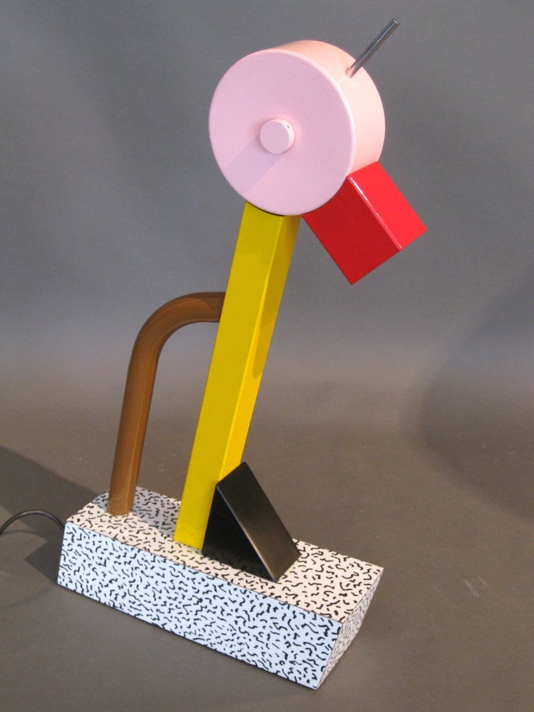 Tahiti lamp designed by Ettore Sottsass for Memphis in 1981. Original edition. Uses 50 watt halogen bulb.

WEEKLY DELIVERIES TO MANHATTAN FOR APPROVAL OR SALES. STANDARD DELIVERY FEE IS $150.